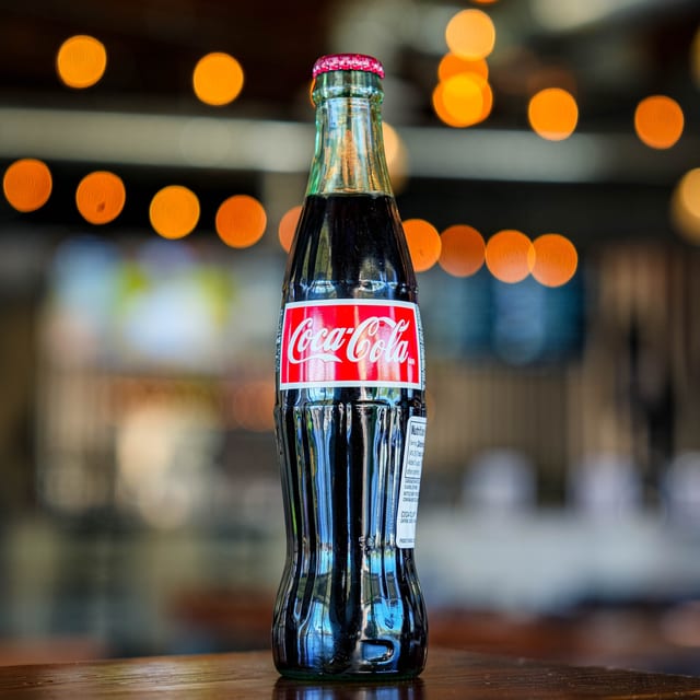 COKE BOTTLE.